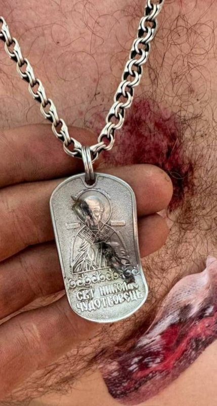 Анна Хорошун: Жетон бойца с изображением Святителя Николая Чудотворца принял на себя удар пули или осколка